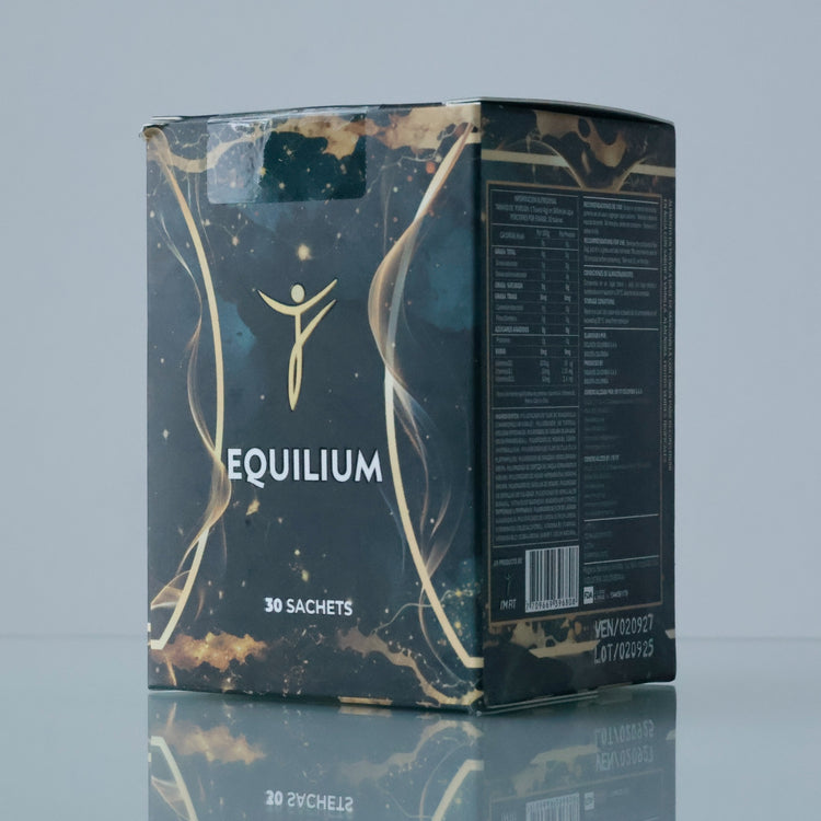 Box of Equilibrium with gold accents on a reflective surface
